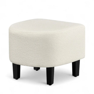 Square ivory boucle ottoman with dark wooden legs, designed to complement the club chair