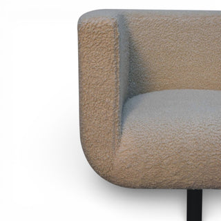 Close-up of a textured chair armrest on a white background