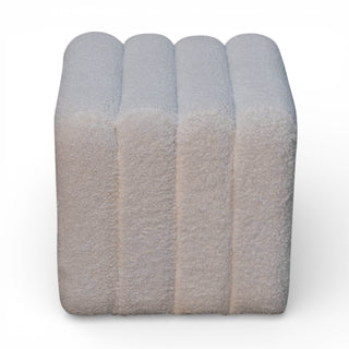Stack of rolled-up towels on a white background