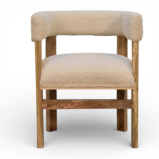 Chair with wooden frame and beige cushioned seat and backrest on a white background