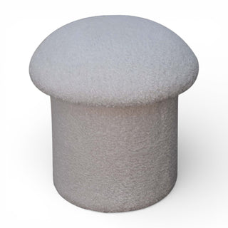 Round gray ottoman on a white background