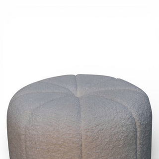 Gray textured cylindrical object on a white background