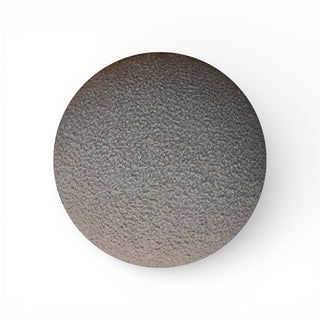 Round gray stone on a white background