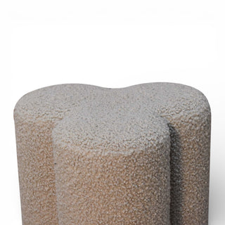 Textured cylindrical object on a white background