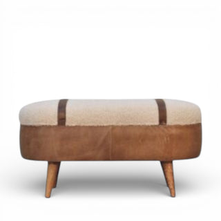 Brown and beige ottoman with wooden legs on a white background