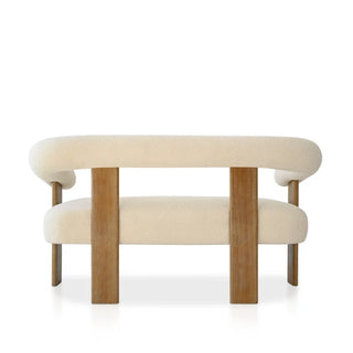 Modern cream boucle loveseat with curved open back design, featuring four solid oak wood legs and plush upholstered seating, shown from a front view against a white background.