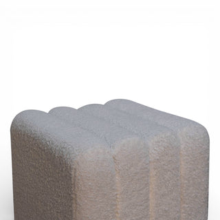 Gray textured cube on a white background