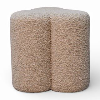 Textured beige ottoman on a white background