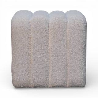 Stack of gray fleece blankets on a white background