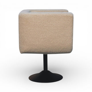 Beige cube-shaped chair with a black base on a white background