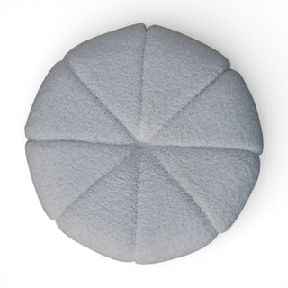 Round gray cushion with a textured surface on a white background
