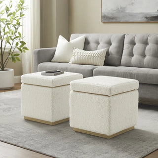 Multiple boucle storage ottomans arranged in living room for expanded storage and seating