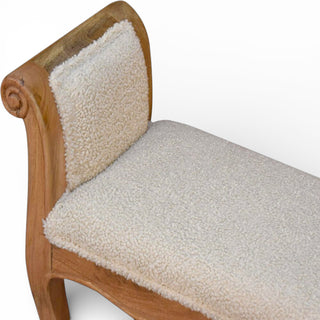 Wooden chair with white cushion on a white background