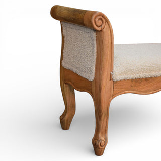 Wooden bench with upholstered seat and backrest on a white background