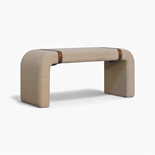 Three-quarter angled view of the Bouclé Bench Cream Leather Strap from the left side showing the bench profile and dual leather straps.


