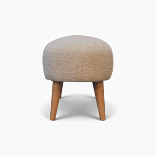 End view of the Bouclé Bench Cream Nordic Hallway showing the narrow rounded profile of the seat and two legs beneath.

