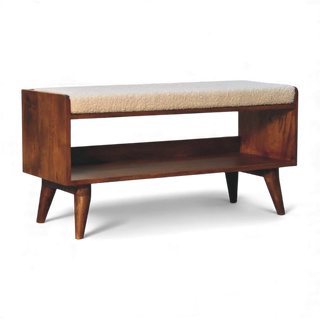 Three-quarter angled view of the Bouclé Bench Cream Nordic Storage from the left side displaying the storage shelf, cream seat, and Nordic-style legs.

