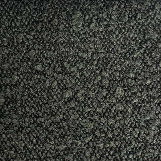 Close-up of charcoal tweed fabric displaying rich texture with subtle variations.