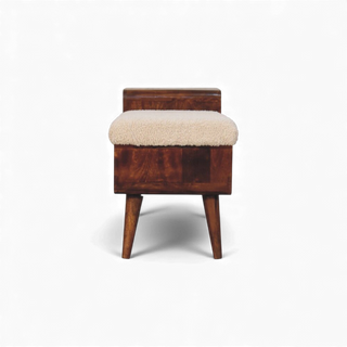 Front facing view of modern dark wood storage bench with upholstered top and open shelf design.