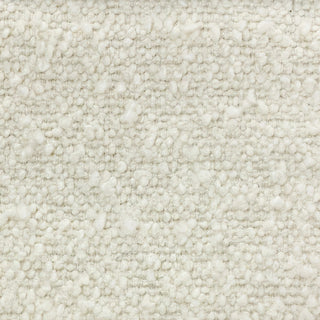 Close-up of ivory tweed fabric featuring light textured surface with subtle flecks.